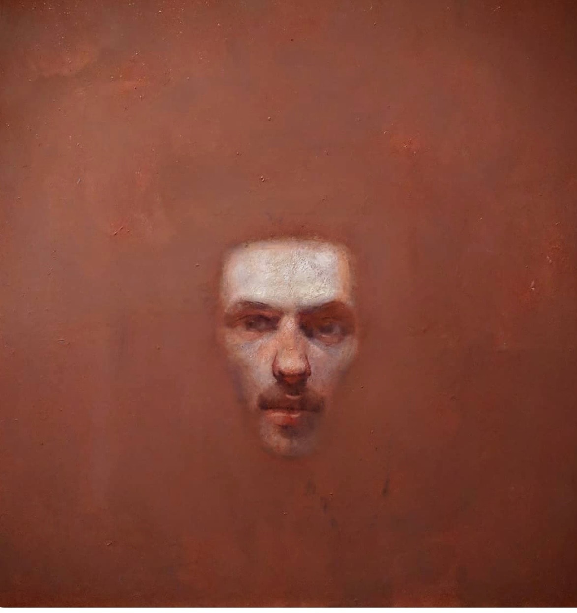 Portrait — face emerging from rust ground, oil on canvas