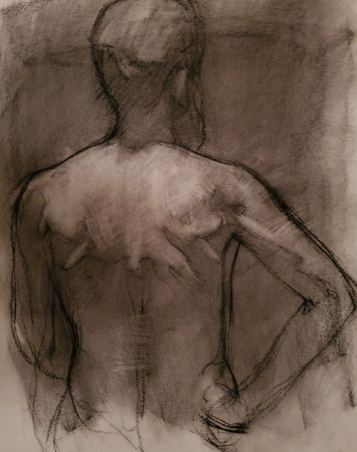 Figure — back view, charcoal on paper